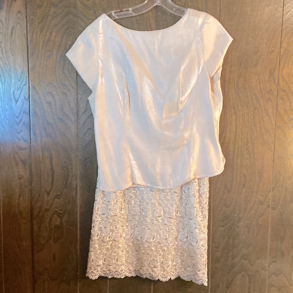 Cream colored top with cream beaded skirt